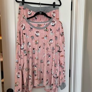 Cuddl duds, pajamas set pink white with Animal characters on them.
